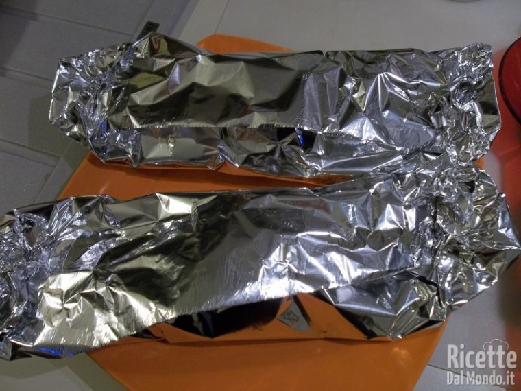 Spigola al Cartoccio con Patate al Forno