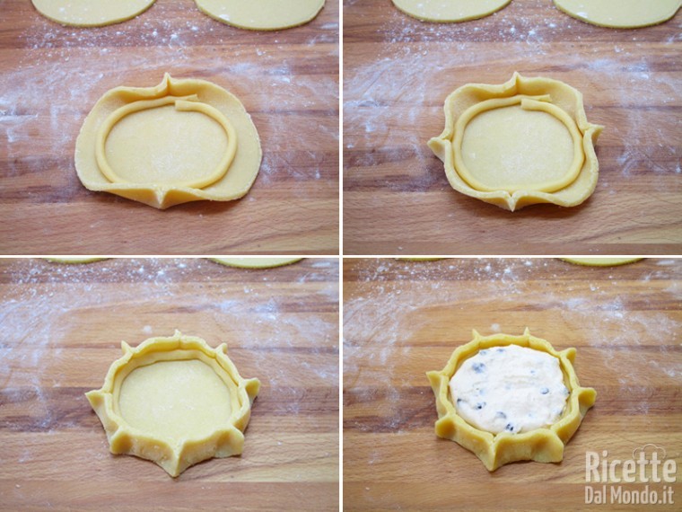 Pizzicare le crostatine e farcire con la crema