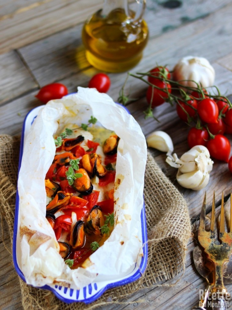 Come fare il filetto di orata al cartoccio con le cozze