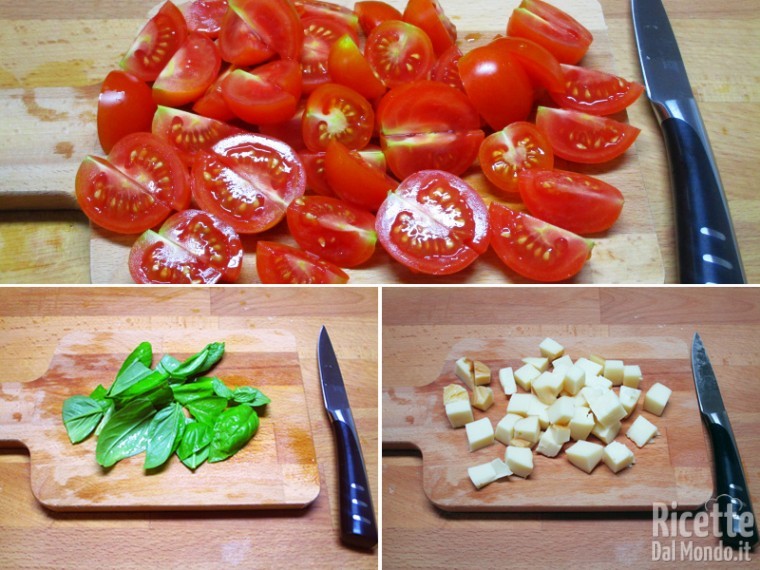 Tagliare pomodori, basilico e provola