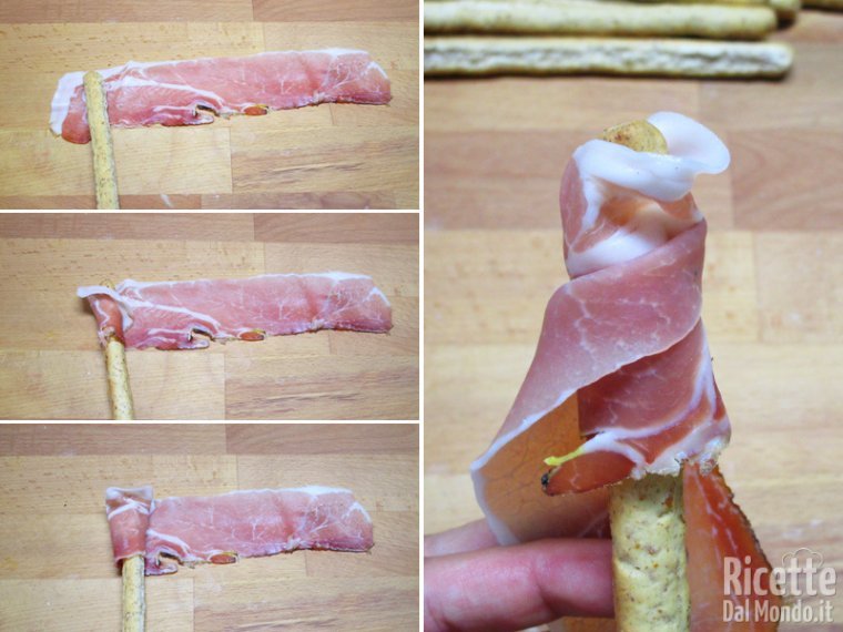 Arrotolare lo speck intorno ai grissini
