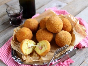 Ricetta Arancini di riso con prosciutto e mozzarella