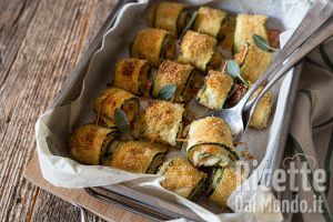 Ricetta Involtini di zucchine al forno. Ricetta veloce per fare i rotolini sfiziosi!