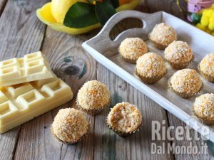 Ricetta Tartufini mimosa cocco e cioccolato bianco. La ricetta dei bocconcini golosi!